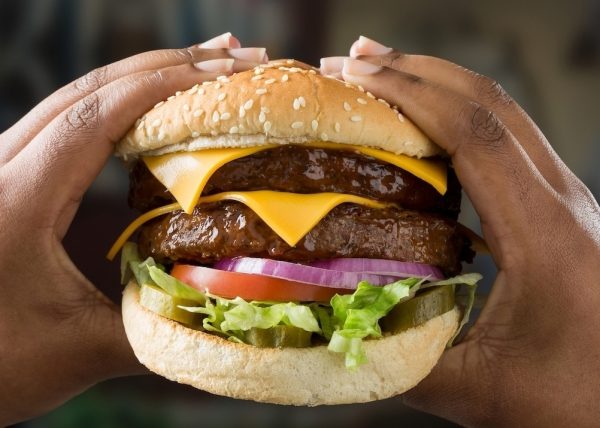 Spur Burger in hands